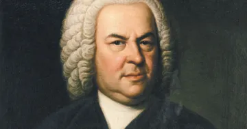 Imagem de Bach, um homem branco, velho, com peruca branca e casaca.